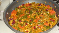 рецепт Фасоль со шпинатом в томатном соусе